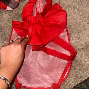 Size small, red raincoat for dogs